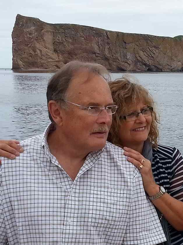 Pastor Jim Mitchell and Claudette Mitchell of Bancroft Bible Chapel, with Percé Rock in the background